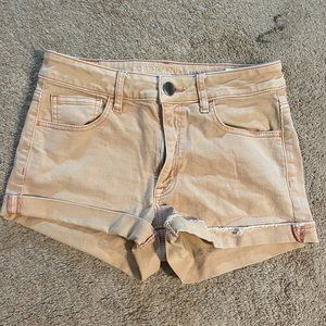 Peach colored denim shorts from American Eagle